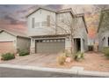 Inviting home with a well-maintained front exterior and a two-car garage, perfect for a Gathering at 4243 Tarim St, Las Vegas, NV 89147
