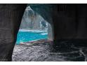 Grotto interior with jacuzzi and view of waterfall and pool at 4745 Gunlock Cir, North Las Vegas, NV 89031