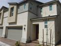 Charming townhome with a well-maintained front exterior and inviting entrance at 5642 Sunset Amber Ave, Las Vegas, NV 89122