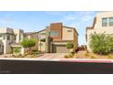 Contemporary two-story home with a private driveway and a well-maintained yard at 6901 Whisper Canyon Pl, North Las Vegas, NV 89084
