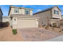 Well-maintained two-story home featuring a spacious two-car garage and manicured landscaping at 7219 Quiet Spring St, North Las Vegas, NV 89084