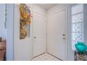 Tiled entryway featuring glass block window and decorative vase in an alcove at 7400 W Flamingo Rd # 1087, Las Vegas, NV 89147