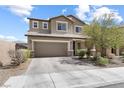 Charming two-story home with a two car garage and well-maintained front yard at 9268 Wildfire Gorge St, Las Vegas, NV 89139