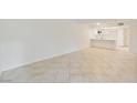 Bright living area with tile flooring, open layout, and access to the kitchen at , Las Vegas, NV 89117