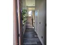 Charming entryway featuring wood floors and stairs at 10091 Sand Key St, Las Vegas, NV 89178