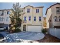 Charming two-story home with a well-manicured lawn and attached two car garage at 1241 Gingerbread Man Ave, Las Vegas, NV 89183