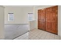 Bright entryway with tile flooring and large double doors at 15 Richland Acres Ct, Henderson, NV 89074