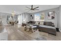 Bright living room features large windows, modern decor, and an open layout at 1836 Soto Ln, North Las Vegas, NV 89032