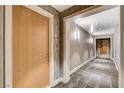 Hallway view with textured wallpaper and modern carpeting at 222 Karen Ave # 1904, Las Vegas, NV 89109