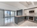 Modern kitchen with stainless steel appliances and marble floors at 222 Karen Ave # 1904, Las Vegas, NV 89109