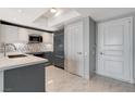 Contemporary kitchen featuring sleek cabinets and marble countertops at 222 Karen Ave # 1904, Las Vegas, NV 89109