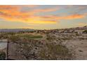 Scenic aerial view overlooking the community golf course with mountains in the distance at 2920 Foxtail Creek Ave, Henderson, NV 89052