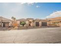 Lovely desert home with a two-car garage, neutral paint and desert landscaping at 479 Apogee, Mesquite, NV 89027