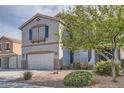 This two-story home features a two-car garage and well-maintained landscaping at 823 Safflower Ct, Henderson, NV 89015