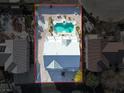 Aerial view of property showing pool, spa, and surrounding landscaping at 9795 La Cienega St, Las Vegas, NV 89183