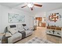 Comfortable living room flowing into the kitchen, creating a cozy atmosphere at 2213 Chandler Ranch Pl, Laughlin, NV 89029