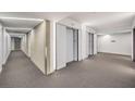 Modern hallway featuring multiple elevators and neutral decor, highlighting sleek design and functionality at 3722 Las Vegas Blvd # 1204, Las Vegas, NV 89158