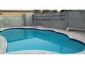 Refreshing backyard pool is fenced, creating a private oasis at 3917 Acapulco Ave, Las Vegas, NV 89121