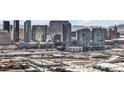 Dense cityscape featuring modern high-rise buildings, commercial and residential areas at 4381 W Flamingo Rd # 3712, Las Vegas, NV 89103