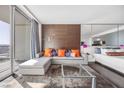 Bright living space with modern sofa, city view and refined accents at 4381 W Flamingo Rd # 3712, Las Vegas, NV 89103