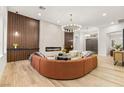 Open living room features accent wall, fireplace, and modern lighting at 800 Jody Brook Ct, Las Vegas, NV 89145