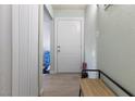 Welcoming foyer with a front door and bench seating upon entry at 4431 Bennett Dr, Las Vegas, NV 89121