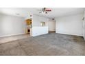 Bright living room with carpet and view of adjacent kitchen, perfect for entertaining at 5908 Gipsy Ave, Las Vegas, NV 89107