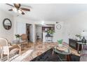 Spacious living room with open access to kitchen, and views of fireplace and dining area at 6800 E Lake Mead Blvd # 2091, Las Vegas, NV 89156