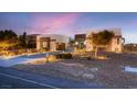 Beautiful single-story home with desert landscaping, hardscape and excellent curb appeal at 7966 W Ford Ave, Las Vegas, NV 89113