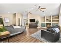 Spacious main bedroom boasts a cozy fireplace and ample natural light at 2021 Summit Pointe Dr, Las Vegas, NV 89117