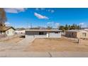 A charming single story home with a low maintenance yard and chain link fence at 352 Cox Ave, Overton, NV 89040