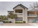 A beautiful view of the home exterior showcasing well maintained shrubs and a balcony at 5161 Lindell Rd # 201, Las Vegas, NV 89118