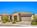 Beautiful single-story home featuring stone accents, tile roofing, paver driveway, and mature landscaping at 6593 Corsari Ridge St, Las Vegas, NV 89166