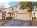 Charming home with a two-car garage, well-maintained landscaping, and inviting curb appeal at 7925 Limbwood Ct, Las Vegas, NV 89131