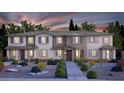 Charming townhome with two stories, lush landscaping, and inviting curb appeal at 965 Nevada State Dr # 36102, Henderson, NV 89002