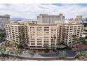 Elegant high-rise building with a luxurious exterior and well-maintained landscaping at 205 E Harmon Ave # 707, Las Vegas, NV 89169