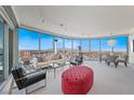 Bright living room with floor-to-ceiling windows offering panoramic city views at 222 Karen Ave # 3908, Las Vegas, NV 89109