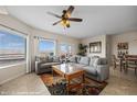 Cozy living room filled with natural light and comfortable seating area at 405 Paradise Pkwy # 170, Mesquite, NV 89027