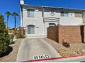 Inviting two-story stucco home with well-maintained landscaping, a spacious driveway, and a peaceful residential setting at 8160 Autumn Star Ave, Las Vegas, NV 89145