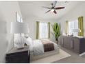 Comfortable bedroom with a ceiling fan, a large bed, an accent plant, a dresser, and bright windows at 8426 Sluman Ct, Las Vegas, NV 89128