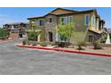 Attractive home featuring stone accents, manicured landscaping, and convenient street parking at 965 Nevada State Dr # 8202, Henderson, NV 89002