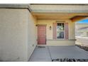 Inviting front entrance features a charming door and a window with decorative shutters at 971 Sable Chase Pl, Henderson, NV 89011