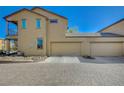 This home has a spacious garage with multiple bays and a convenient paved driveway at 971 Sable Chase Pl, Henderson, NV 89011