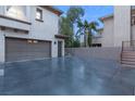 Attached two-car garage with ample parking space in the driveway at 10412 Mansion Hills Ave, Las Vegas, NV 89144