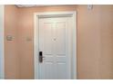 Hotel room door with unit numbers on the wall and the entry door at 145 E Harmon Ave # 2021, Las Vegas, NV 89109