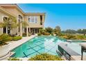 Inviting backyard pool and spa with meticulously maintained landscaping, perfect for relaxation and entertainment at 1704 Wincanton Dr, Las Vegas, NV 89134