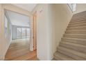 Bright entryway leads to an open living area and staircase at 31 Castleton Tower Ct, Henderson, NV 89011