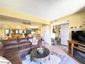 Open-concept living area flows into the kitchen, perfect for entertaining guests and Gathering at 3740 Desert Marina Dr # 3, Laughlin, NV 89029