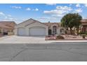 Beautiful home featuring a low maintenance desert landscape and a three car garage at 8101 Deep Stone Ave, Las Vegas, NV 89149