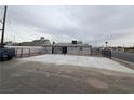 A large concrete pad in a fenced backyard, offering lots of potential at 2036 Canosa Ave, Las Vegas, NV 89104